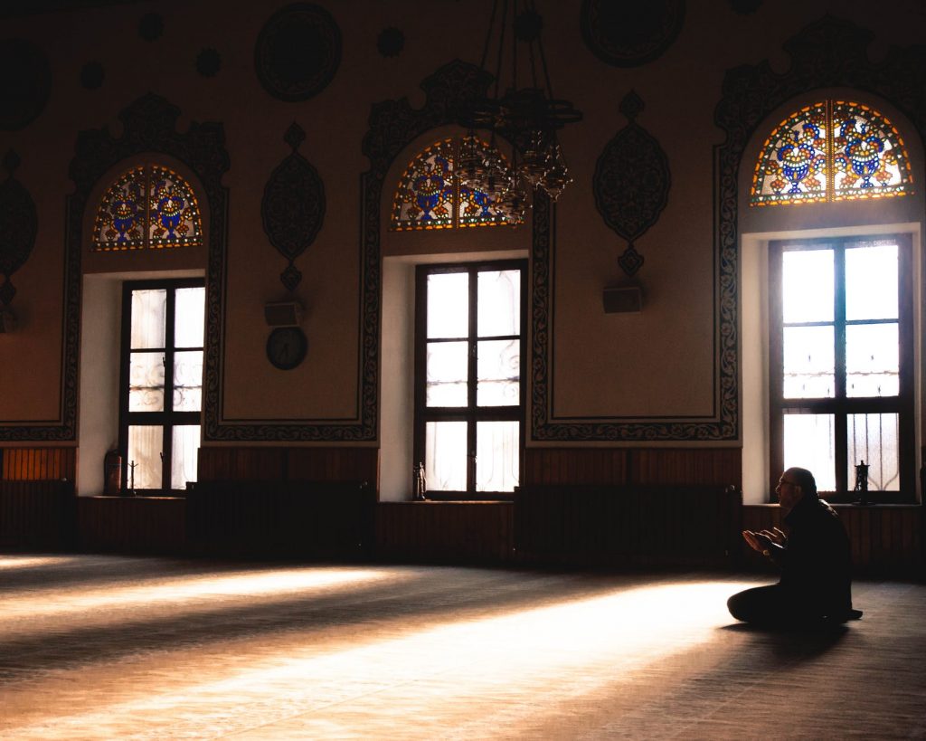 unknown person sitting indoors
