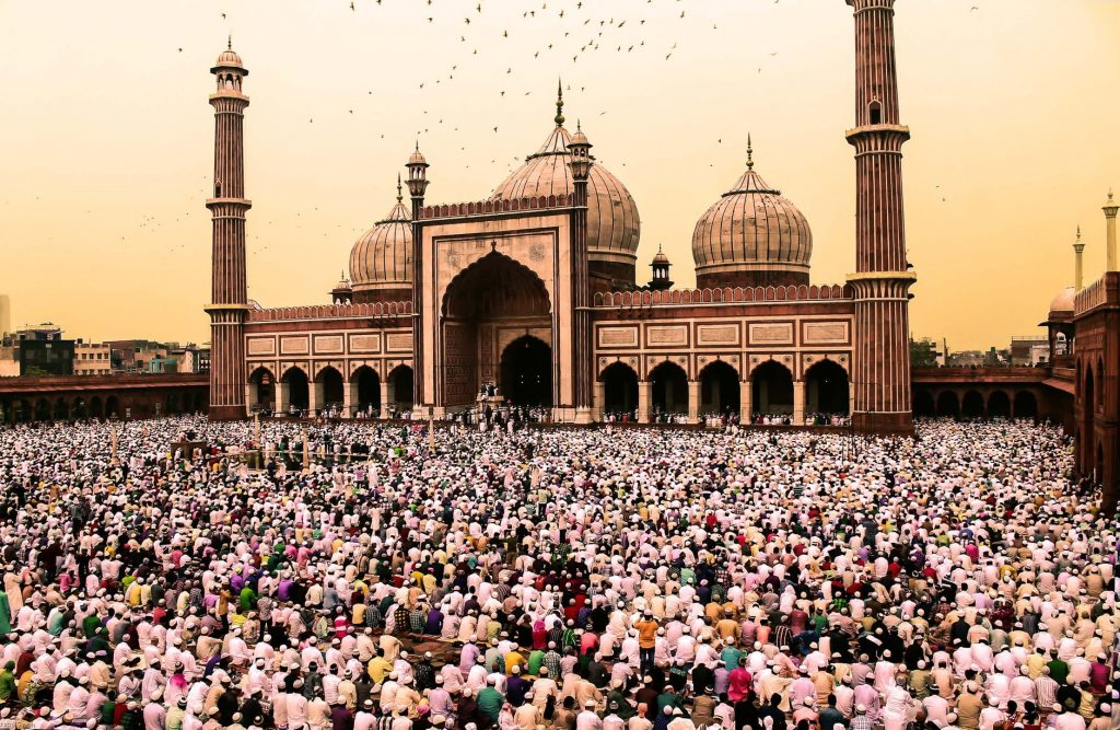 crowd of people gathering near jama masjid delhi