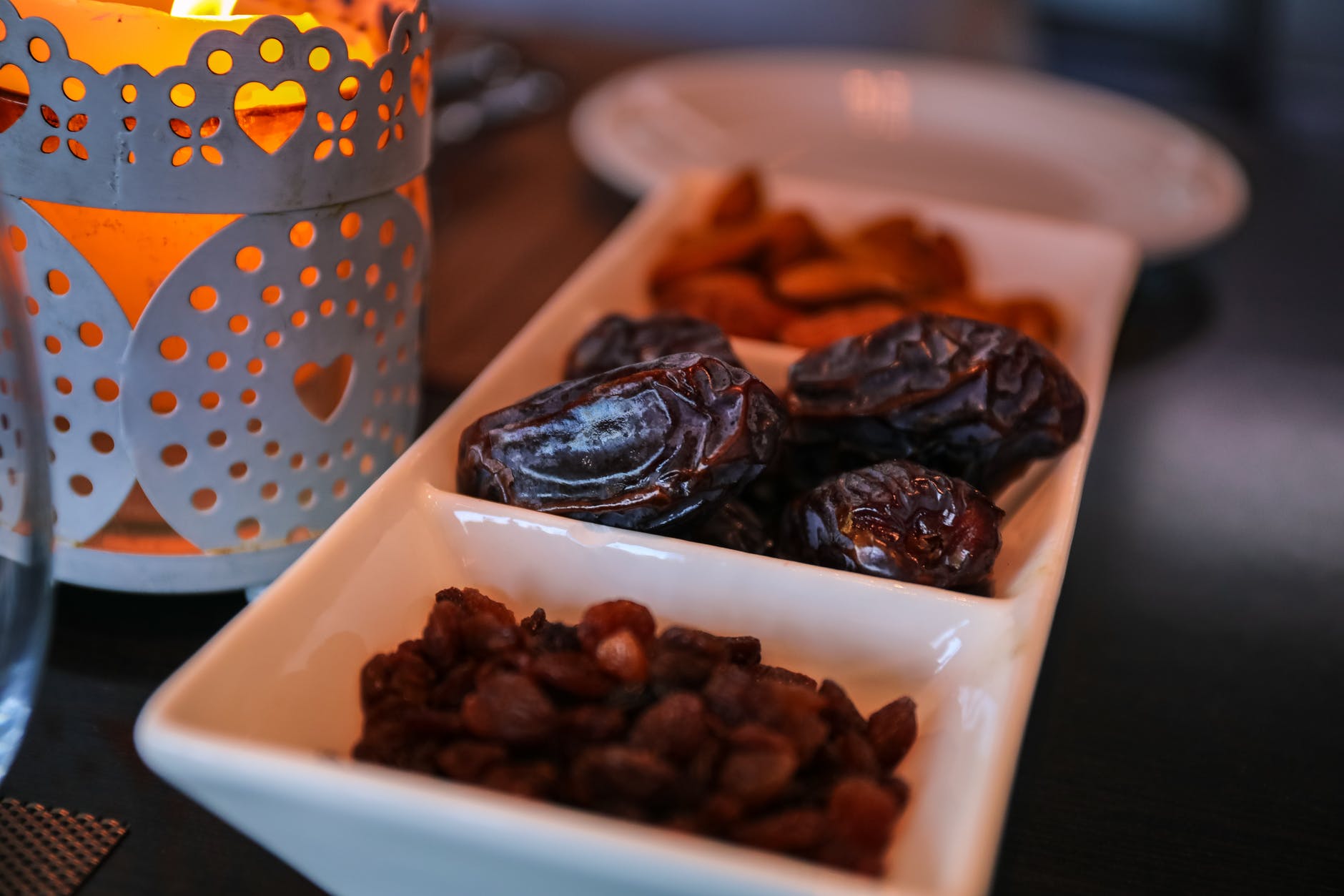 close up photo of raisins and dates