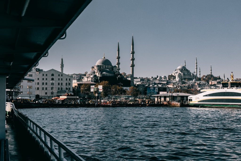embankment with sea and ancient mosque